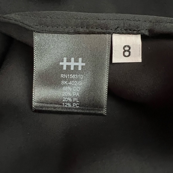 Hiraeth black skirt with zip close. A bit of a mesh overlay and lined No stretch - Picture 4 of 5